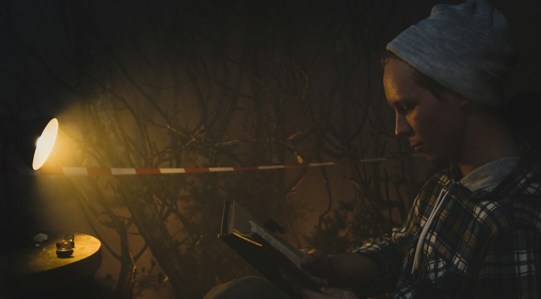 detective reading mystery book