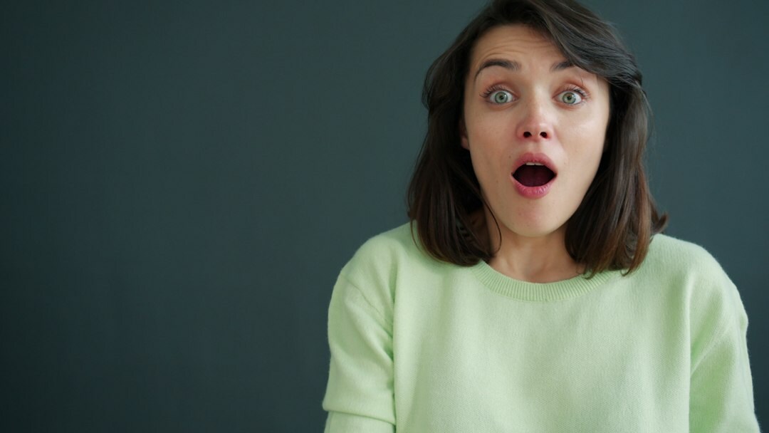 woman with hidden expression