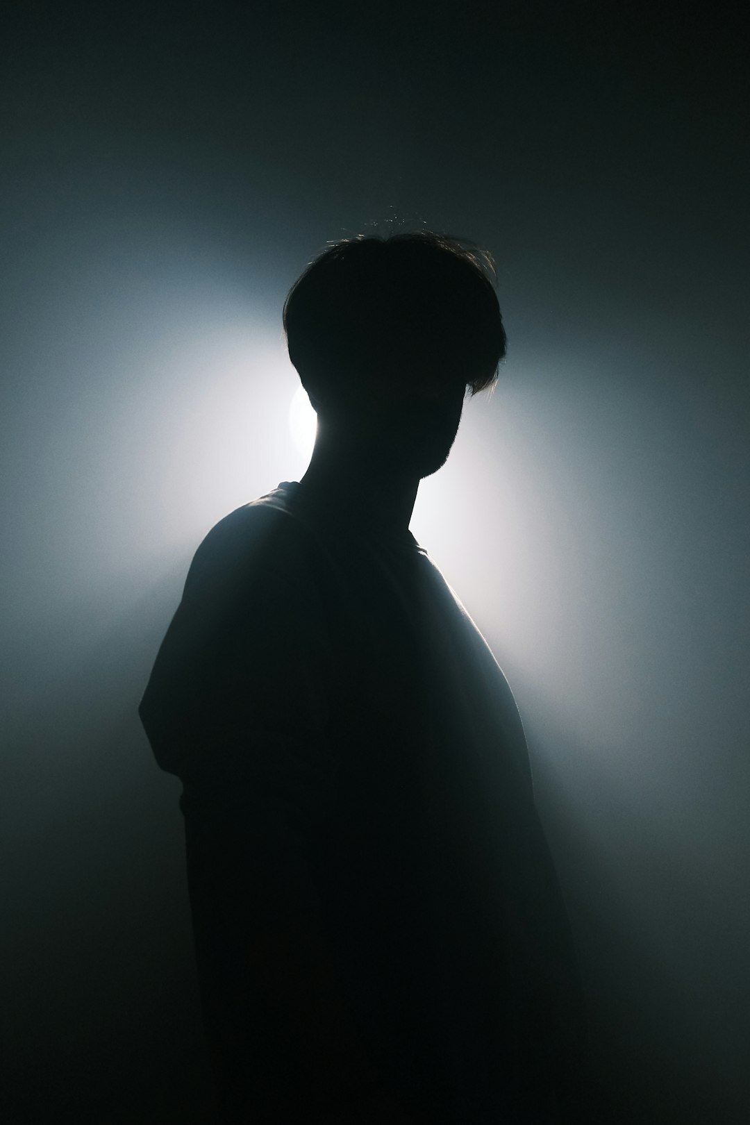mysterious man in shadow